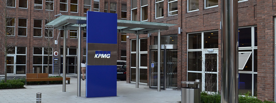 Stainless steel entrance totem by KPMG